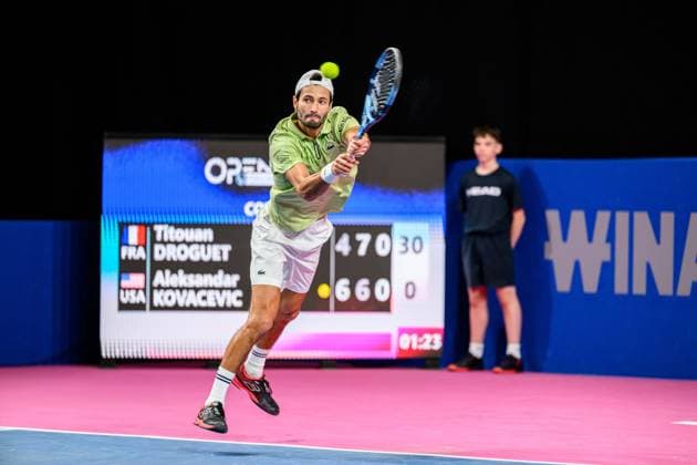 February 5, 2026, Perols, Montpellier, Occitanie, France: Titouan Droguet of France delivers a back hand shot during his match against Aleksandar Kovacevic of the United States at Open Occitanie on February 5, 2026, at Sud de France Arena in Montpellier, France. Perols, Montpellier France - ZUMAc313 20260205_zsp_c313_003 Copyright: xFaresxChafaix