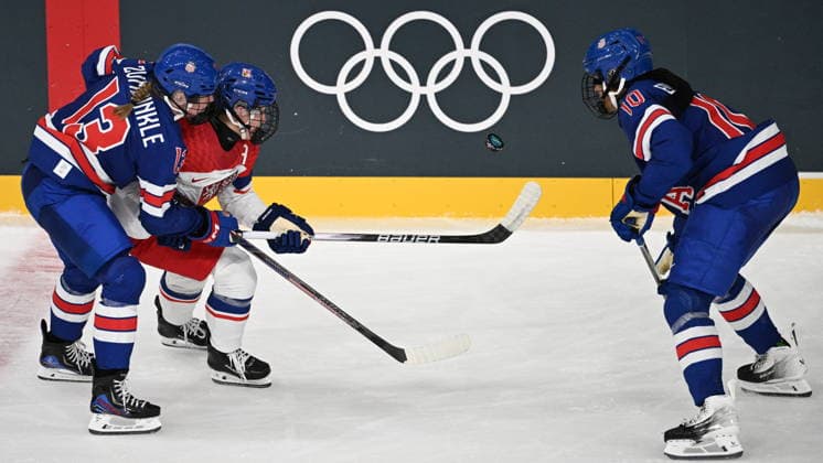 From left Grace Zumwinkle of USA, Czech Denisa Krizova, Laila Edwards of USA in action during the women s preliminary round Group A Ice hockey, Eishockey match between USA and Czech Republic at the Milano Rho Ice Hockey Arena during the Milano Cortina 2026 Winter Olympic Games, Olympische Spiele, Olympia, OS in Milan, on February 5, 2026. (CTKxPhoto MichalxKamaryt) CTKPhotoP2026020508515  CTKPhotoP2026020508515