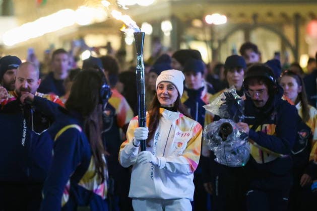 ITALY, MILAN - FEBRUARY 5, 2026: La Scala Theatre Ballet prima ballerina Nicoletta Manni is seen during a ceremony marking the arrival of the Milano Cortina 2026 Olympic Flame at Piazza del Duomo. The two-month Olympic Torch Relay, which started in December 2025, followed a 12,000 km route across Italy finally reaching Milan on 5 February 2026. Peter Kovalev TASS  88260777