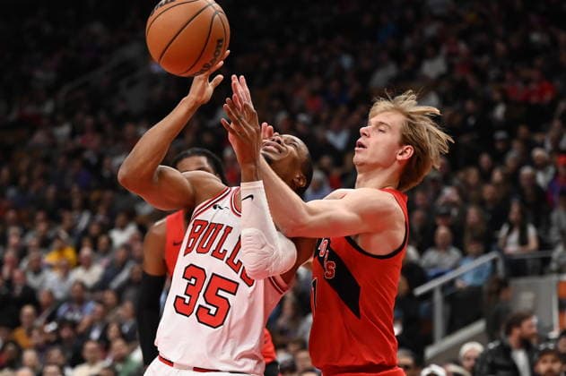 February 5, 2026, Toronto, On, Canada: Chicago Bulls Isaac Okoro (35) is fouled by Toronto Raptors Gradey Dick (1) during first half NBA, Basketball Herren, USA basketball game action in Toronto on Thursday, Feb. 5, 2026. Isaac Okoro, Grady Dick  - ZUMAc35_ 20260205_zaf_c35_150 Copyright: xJonxBlackerx