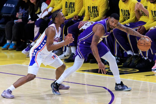 February 5, 2026, Los Angeles, California, USA: Tyrese Maxey 0 of the Philadelphia 76ers guards Marcus Smart 36 of the Los Angeles Lakers during their regular season NBA, Basketball Herren, USA game on Thursday February 5, 2026 at Crypto.com Arena in Los Angeles, California. ARIANA RUIZ PI Los Angeles USA - ZUMAp124 20260205_zaa_p124_017 Copyright: xArianaxRuizx