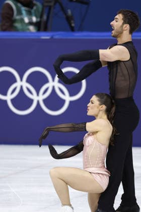 Milan Cortina Olympics: Figure skating, Eiskunstlauf French ice dancers Laurence Fournier Beaudry (L) and Guillaume Cizeron perform their rhythm dance during the figure skating team event at the Milan Cortina Olympics at Milano Ice Skating Arena in Milan on Feb. 6, 2026.  A14AA0005248702P