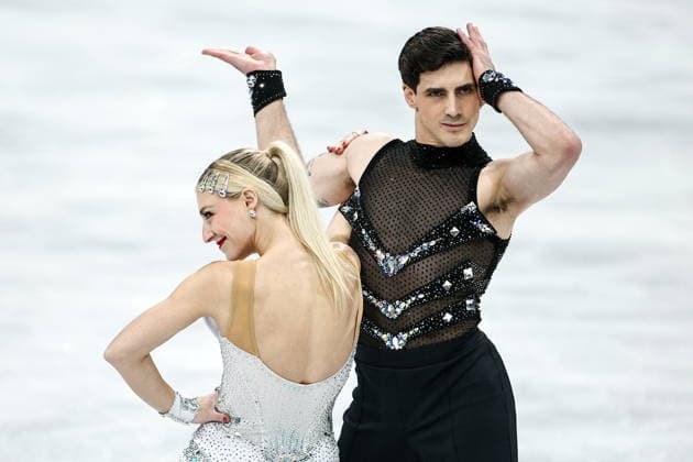 ITALY, MILAN - FEBRUARY 6, 2026: Ice dancers Piper Gilles (L) and Paul Poirier of Canada perform their rhythm dance during the team Figure skating, Eiskunstlauf event at Milano Ice Skating Arena as part of the 2026 Winter Olympic Games, Olympische Spiele, Olympia, OS Mikhail Tereshchenko TASS  88275630