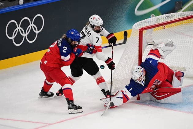 L-R Aneta Tejralova (SUI), Lara Stalder (SUI) and goalkeeper Michaela Hesova (CZE) in action during women s Ice hockey, Eishockey match of Group A: Czechia vs Switzerland, at the Milano Cortina 2026 Winter Olympic Games, Olympische Spiele, Olympia, OS in Milan, Italy, on February 6, 2026. (CTKxPhoto MichalxKamaryt) CTKPhotoP2026020607416  CTKPhotoP2026020607416