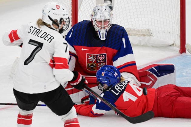 L-R Lara Stalder (SUI) and goalkeeper Michaela Hesova and Dominika Laskova (CZE) in action during women s Ice hockey, Eishockey match of Group A: Czechia vs Switzerland, at the Milano Cortina 2026 Winter Olympic Games, Olympische Spiele, Olympia, OS in Milan, Italy, on February 6, 2026. (CTKxPhoto MichalxKamaryt) CTKPhotoP2026020607457  CTKPhotoP2026020607457
