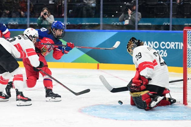 L-R Barbora Jurickova (CZE) and goalkeeper Saskia Maurer (SUI) in action during women s Ice hockey, Eishockey match of Group A: Czechia vs Switzerland, at the Milano Cortina 2026 Winter Olympic Games, Olympische Spiele, Olympia, OS in Milan, Italy, on February 6, 2026. (CTKxPhoto MichalxKamaryt) CTKPhotoP2026020607617  CTKPhotoP2026020607617