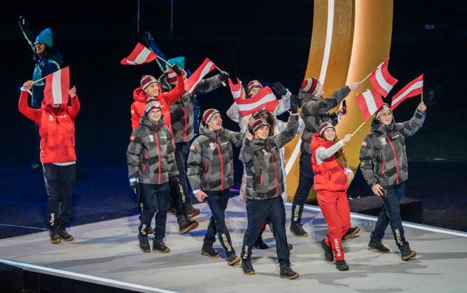 The Austrian team participates in the parade of athletes during the Opening Ceremony of the Milano Cortina 2026 Olympic Games, Olympische Spiele, Olympia, OS at San Siro Stadium in Milan, Italy, on Friday, February 6, 2026. More than 2,900 athletes from 92 national Olympic committees will compete, with the United States having the largest presence with more than 230 athletes.  OLY20260206123 RICHARDxELLIS
