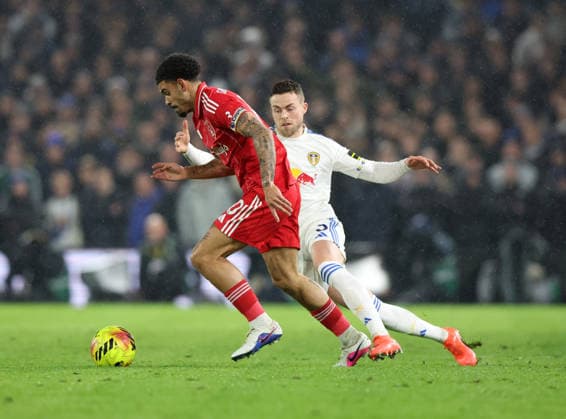 Leeds, England, 6th February 2026. Morgan Gibbs White of Nottingham Forest and Gabriel Gudmundsson of Leeds United during the Leeds United vs Nottingham Forest Premier League match at Elland Road, Leeds. Picture credit should read: Nigel Roddis Sportimage EDITORIAL USE ONLY. No use with unauthorised audio, video, data, fixture lists, club league logos or live services. Online in-match use limited to 120 images, no video emulation. No use in betting, games or single club league player publications. SPI_017_NR_LEED_NOTT SPI-4510-0016