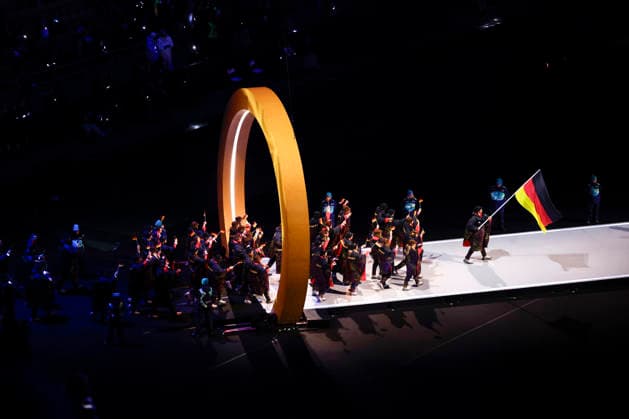 Athletes from team Germany participate in the Opening Ceremony of the Milano Cortina 2026 Olympic Games, Olympische Spiele, Olympia, OS at San Siro Stadium in Milan, Italy, on Friday, February 6, 2026. More than 2,900 athletes from 92 national Olympic committees will compete, with the United States having the largest presence with more than 230 athletes.  OLY20260206331 AARONxJOSEFCZYK
