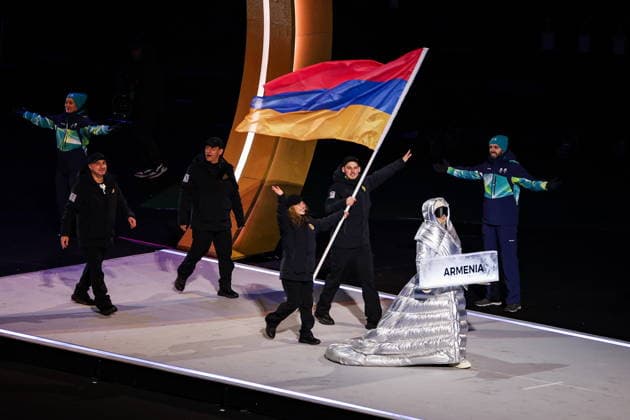 ITALY, MILAN - FEBRUARY 6, 2026: Members of the Olympic team of Armenia emerge during a ceremony to open the 2026 Winter Olympic Games, Olympische Spiele, Olympia, OS at San Siro Stadium. Peter Kovalev TASS  88299065
