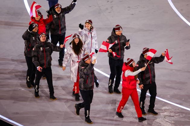 ITALY, MILAN - FEBRUARY 6, 2026: Members of the Olympic team of Austria emerge during a ceremony to open the 2026 Winter Olympic Games, Olympische Spiele, Olympia, OS at San Siro Stadium. Peter Kovalev TASS  88299184