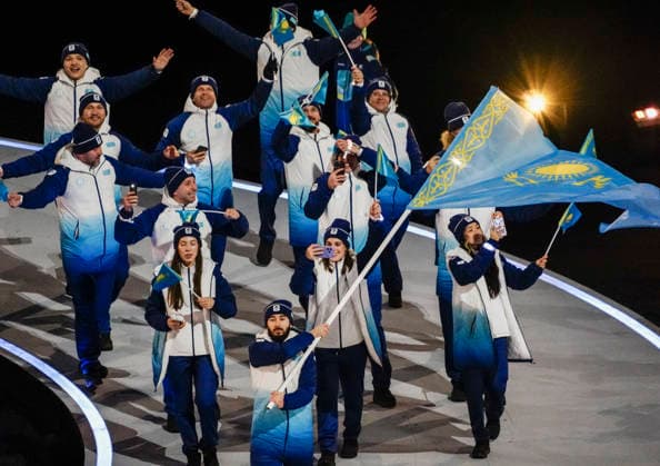 Athletes from Kazakistan walk in the parade of athletes during the Opening Ceremony of the Milano Cortina 2026 Olympic Games, Olympische Spiele, Olympia, OS at San Siro Stadium in Milan, Italy, on Friday, February 6, 2026. More than 2,900 athletes from 92 national Olympic committees will compete, with the United States having the largest presence with more than 230 athletes.  OLY20260206142 RICHARDxELLIS