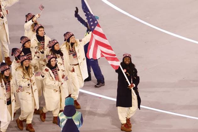 MILAN , 06-02-2026 , Milano San Siro Olympic Stadium , Olympic Winter games, Winterspiele,Spiele, Summer games 2026 Milano , Opening ceremony , Picture shows , Team USA with flag carrier Erin Jackson Olympic Winter Games 2026 - Opening ceremony  x201349721x Copyright:
