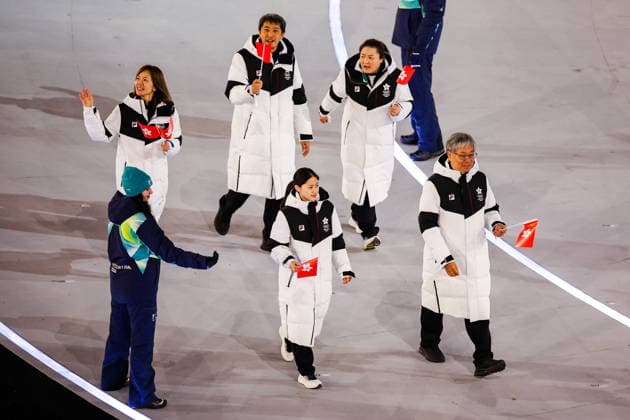 ITALY, MILAN - FEBRUARY 6, 2026: Members of the Olympic team of Hong Kong emerge during a ceremony to open the 2026 Winter Olympic Games, Olympische Spiele, Olympia, OS at San Siro Stadium. Peter Kovalev TASS  88301293