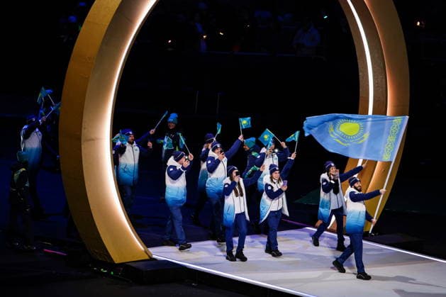 ITALY, MILAN - FEBRUARY 6, 2026: Members of the Olympic team of Kazakhstan emerge during a ceremony to open the 2026 Winter Olympic Games, Olympische Spiele, Olympia, OS at San Siro Stadium. Peter Kovalev TASS  88301298