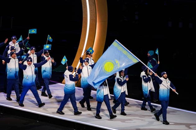 ITALY, MILAN - FEBRUARY 6, 2026: Members of the Olympic team of Kazakhstan emerge during a ceremony to open the 2026 Winter Olympic Games, Olympische Spiele, Olympia, OS at San Siro Stadium. Peter Kovalev TASS  88301300