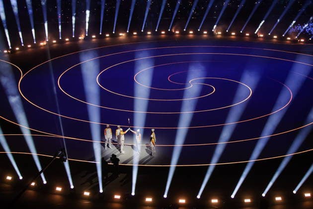 ITALY, MILAN - FEBRUARY 6, 2026: The Olympic flame emerges during a ceremony to open the 2026 Winter Olympic Games, Olympische Spiele, Olympia, OS at San Siro Stadium. Peter Kovalev TASS  88305533