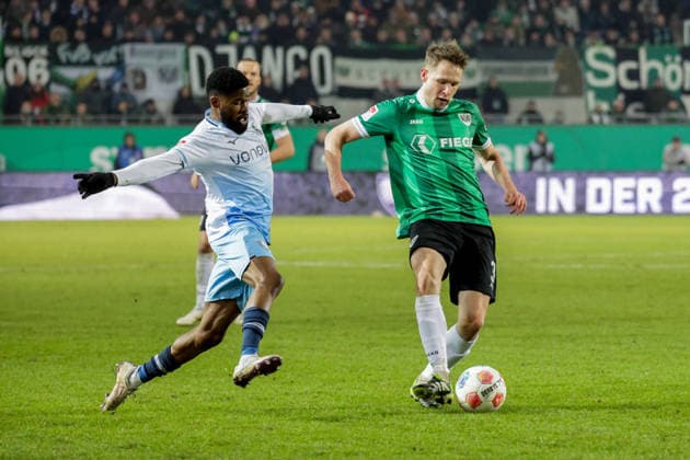 06.02.2026, xgrfx, Fussball 2.Bundesliga, Preußen Münster - VfL Bochum v.l. Moritz Kwarteng (VfL Bochum), Paul Jaeckel (Preußen Münster) (DFL DFB REGULATIONS PROHIBIT ANY USE OF PHOTOGRAPHS as IMAGE SEQUENCES and or QUASI-VIDEO) Münster
