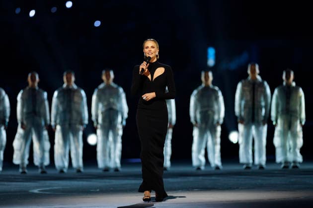 (260207) -- MILAN, Feb. 7, 2026 -- Actress Charlize Theron performs during the opening ceremony of the Milan-Cortina 2026 Olympic Winter games, Winterspiele,Spiele, Summer games at the San Siro Olympic Stadium in Milan, Italy, Feb. 6, 2026. ) (MICO2026)ITALY-MILAN-CORTINA 2026-OLYMPIC WINTER GAMES-OPENING CEREMONY LixMing 