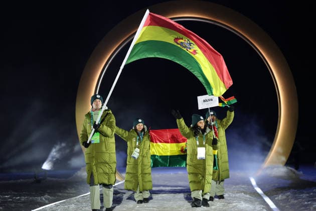 (260207) -- PREDAZZO, Feb. 7, 2026 -- The delegation of Bolivia parades into the Predazzo Ski jumping, Skispringen, Ski, nordisch Stadium during the opening ceremony of the Milan-Cortina 2026 Olympic Winter games, Winterspiele,Spiele, Summer games in Predazzo, Italy, Feb. 6, 2026. ) (MICO2026)ITALY-MILAN-CORTINA 2026-OLYMPIC WINTER GAMES-OPENING CEREMONY HuangxWei 