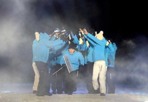 (260207) -- PREDAZZO, Feb. 7, 2026 -- The delegation of Estonia parades into the Predazzo Ski jumping, Skispringen, Ski, nordisch Stadium during the opening ceremony of the Milan-Cortina 2026 Olympic Winter games, Winterspiele,Spiele, Summer games in Predazzo, Italy, Feb. 6, 2026. ) (MICO2026)ITALY-MILAN-CORTINA 2026-OLYMPIC WINTER GAMES-OPENING CEREMONY HuangxWei 