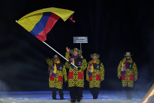 (260207) -- PREDAZZO, Feb. 7, 2026 -- The delegation of Colombia parades into the Predazzo Ski jumping, Skispringen, Ski, nordisch Stadium during the opening ceremony of the Milan-Cortina 2026 Olympic Winter games, Winterspiele,Spiele, Summer games in Predazzo, Italy, Feb. 6, 2026. ) (MICO2026)ITALY-MILAN-CORTINA 2026-OLYMPIC WINTER GAMES-OPENING CEREMONY HuangxWei 