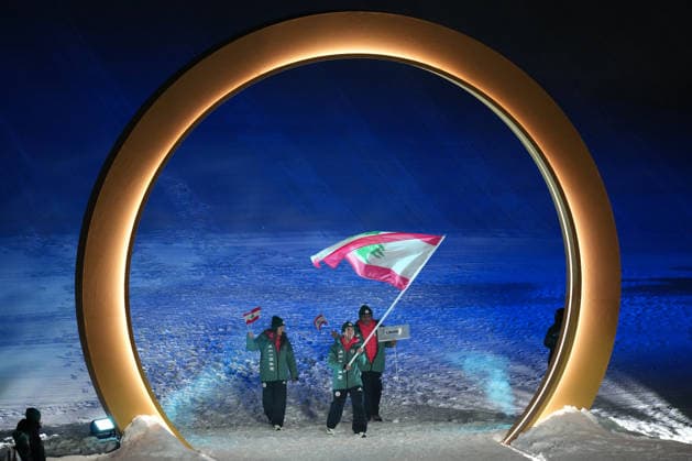(260207) -- LIVIGNO, Feb. 7, 2026 -- Members of the delegation of Lebanon attend the parade of athletes during the opening ceremony of the Milan-Cortina 2026 Olympic Winter games, Winterspiele,Spiele, Summer games in Livigno, Italy, Feb. 6, 2026. ) (MICO2026)ITALY-MILAN-CORTINA 2026-OLYMPIC WINTER GAMES-OPENING CEREMONY XiaxYifang 