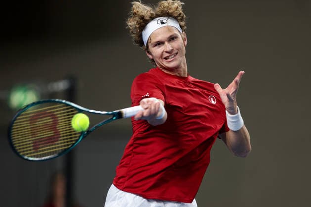 (260207) -- VARAZDIN, Feb. 7, 2026 -- August Holmgren of Team Denmark hits a return in the second match against Dino Prizmic of Team Croatia during the Davis Cup Qualifier first round match between Croatia and Denmark in Varazdin, Croatia, on Feb. 6, 2026. (Photo by PIXSELL via Xinhua) (SP)CROATIA-VARAZDIN-TENNIS-DAVIS CUP-CRO VS DEN IgorxKralj 