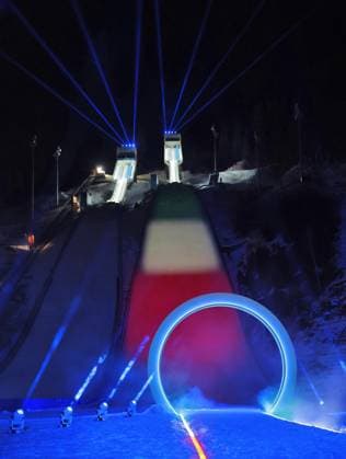 Milan Cortina Olympics: Opening ceremony The Italian flag is projected on a Ski jumping, Skispringen, Ski, nordisch slope during the opening ceremony of the Milan Cortina Olympics in Predazzo, Italy, on Feb. 6, 2026.  A14AA0005252032P