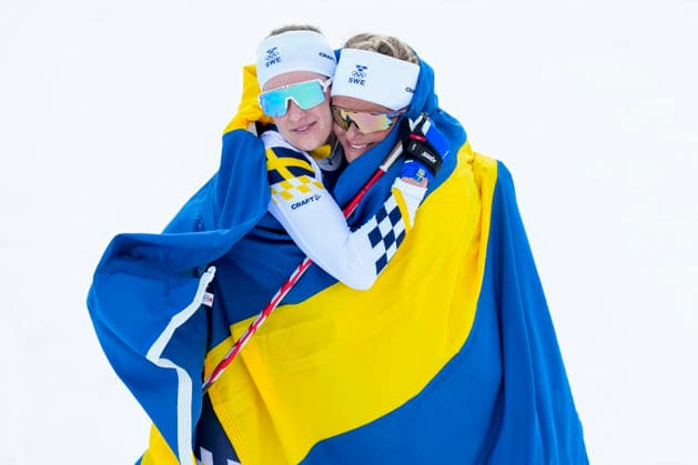 Winter Olympics in Milan Cortina 2026 Val di Fiemme, Italy 20260207. Frida Karlsson from Sweden and Ebba Andersson from Sweden cheer during the women s cross-country 20 km Skiathlon at Lago di Tesero during the Milan Cortina 2026 Winter Olympics. Photo: Lise Aserud NTB Val di Fiemme Italy EDITORIAL USE ONLY. RESTRICTED USE FOR BETTING COMPANIES Ref:_SPODMcUL9XEGZ8.jpg *** Winter Olympics in Milan Cortina 2026 Val di Fiemme, Italy 20260207 Frida Karlsson from Sweden and Ebba Andersson from Sweden cheer during the women s cross country 20 km Skiathlon at Lago di Tesero during the Milan Cortina 2026 Winter Olympics Photo Lise Aserud NTB Val di Fiemme Italy EDITORIAL USE ONLY RESTRICTED USE FOR BETTING COMPANIES  Copyright: xLisexAserudx xNTBx