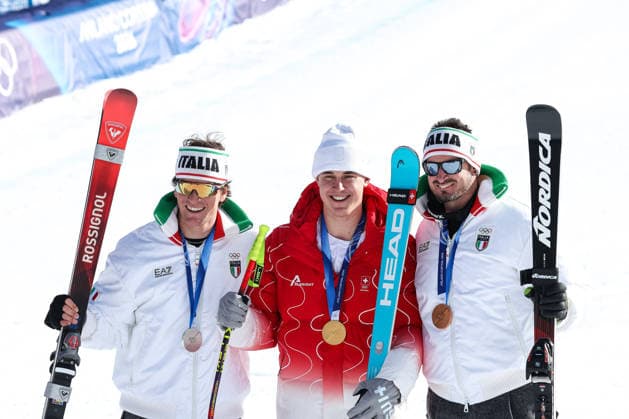 Giovanni Franzoni (ITA), Franjo von Allmen (SUI) and Dominik Paris (ITA) showing medals and skis with happiness after winning the race at the end of the Olympic Winter games, Winterspiele,Spiele, Summer games Milano-Cortina 2026, Alpine Skiing Men s Downhill on February 07, 2026 at Stelvio Ski Centre in Bormio, Italy  Copyright: xSergioxBisi IPAxSportx xipa-agency.netx xx IPA_71065650 IPA_Agency_IPA71065650