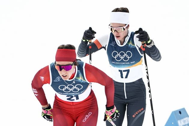 ITALY, TRENTINO-SOUTH TYROL - FEBRUARY 7, 2026: Anja Weber (front) of Switzerland, and Dariya Nepryaeva of Russia compete in a women s 10km + 10km skiathlon race during the 2026 Winter Olympic Games, Olympische Spiele, Olympia, OS at the Tesero Cross-Country Skiing Stadium. Mikhail Tereshchenko TASS  88323187