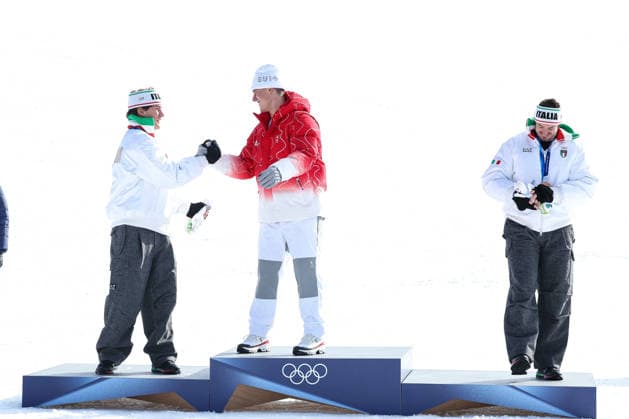 Franjo von Allmen (SUI) , Giovanni Franzoni (ITA) and Dominik Paris (ITA) over the podium at the end of the Olympic Winter games, Winterspiele,Spiele, Summer games Milano-Cortina 2026, Alpine Skiing Men s Downhill on February 07, 2026 at Stelvio Ski Centre in Bormio, Italy  Copyright: xSergioxBisi IPAxSportx xipa-agency.netx xx IPA_71065059 IPA_Agency_IPA71065059