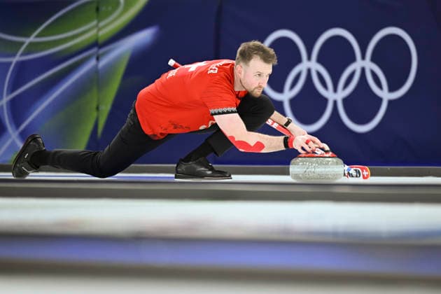 (260207) -- CORTINA D AMPEZZO, Feb. 7, 2026 -- Yannick Schwaller of Switzerland competes during the curling mixed doubles round robin session 7 match between Switzerland and Sweden of the 2026 Milan-Cortina Winter Olympics in Cortina D Ampezzo, Italy, Feb. 7, 2026. ) (MICO2026)ITALY-CORTINA D AMPEZZO-OLYMPIC Winter games, Winterspiele,Spiele, Summer games CURLING-MIXED DOUBLES-ROUND ROBIN LianxYi 