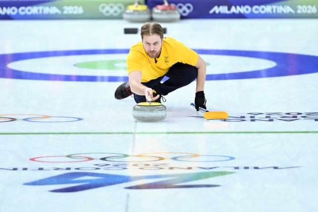 (260207) -- CORTINA D AMPEZZO, Feb. 7, 2026 -- Rasmus Wranaa of Sweden competes during the curling mixed doubles round robin session 7 match between Switzerland and Sweden of the 2026 Milan-Cortina Winter Olympics in Cortina D Ampezzo, Italy, Feb. 7, 2026. ) (MICO2026)ITALY-CORTINA D AMPEZZO-OLYMPIC Winter games, Winterspiele,Spiele, Summer games CURLING-MIXED DOUBLES-ROUND ROBIN LianxYi 