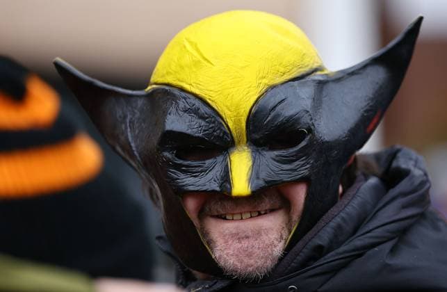 A fan of wearing face mask Wolverhampton Wanderers v Chelsea, Premier League, Football, Molineux, Wolverhampton, UK - 07 Feb 2026Wolverhampton Molineux United Kingdom EDITORIAL USE ONLY No use with unauthorised audio, video, data, fixture lists, club league logos or live services. Online in-match use limited to 120 images, no video emulation. No use in betting, games or single club league player publications.  Copyright: xMichaelxZemanek Shutterstockx 16524375a