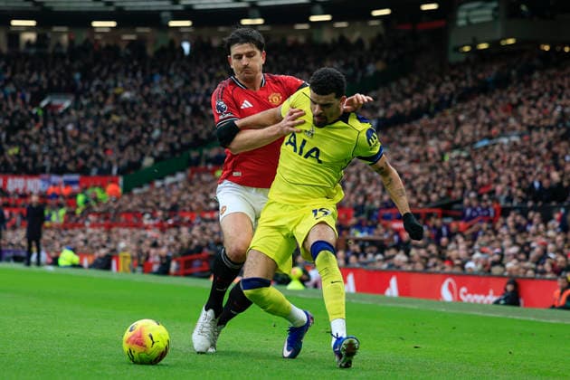 Manchester United, ManU v Tottenham Hotspur, Premier League Harry Maguire (5) of Manchester United and Dominic Solanke (19) of Tottenham Hotspur challenge for the ball during the Premier League match between Manchester United and Tottenham Hotspur at Old Trafford, Manchester, UK on 7 February 2026. Manchester Old Trafford Greater Manchester UK Editorial use only DataCo restrictions apply See www.football-dataco.com , Copyright: xConorxMolloyx PSI-23700-0041
