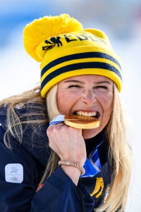 260207 Frida Karlsson of Sweden celebrates with her gold medal after the women s 20 km cross-country skiing skiathlon during day 1 of the 2026 Winter Olympics on February 7, 2026 in Val di Fiemme. Photo: Maxim Thore BILDBYRAN kod MT MT0961 skidor cross-country skiing langrenn Olympic Games, Olympische Spiele, Olympia, OS olympics winter olympics os ol olympiska spel vinter-os olympiske leker milano cortina 2026 milan cortina 2026 milano cortina 2026 olympic games milano cortina 2026 winter olympic games milano cortina-os milano cortina-ol vinter-ol 1 bbeng skiathlon dam os-guld guld jubel medalj sverige *** 260207 Frida Karlsson of Sweden celebrates with her gold medal after the women s 20 km cross country skiing skiathlon during day 1 of the 2026 Winter Olympics on February 7, 2026 in Val di Fiemme Photo Maxim Thore BILDBYRAN kod MT MT0961 skidor cross country skiing langrenn olympic games olympics winter olympics os ol olympiska spel vinter os olympiske leker milano cortina 2026 milan cortina 2026 milano cortina 2026 olympic games milano cortina 2026 winter olympic games milano cortina os milano cortina ol vinter ol 1 bbeng skiathlon dam os guld guld jubel medalj sverige  Copyright: MAXIMxTHORE BB260207MT095