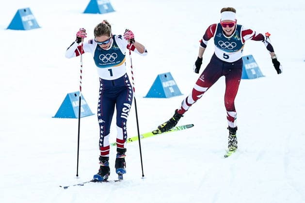ITALY, TRENTINO-SOUTH TYROL - FEBRUARY 7, 2026: Jessie Diggins (front) of the US, and Teresa Stadlober of Austria compete in a women s 10km + 10km skiathlon race during the 2026 Winter Olympic Games, Olympische Spiele, Olympia, OS at the Tesero Cross-Country Skiing Stadium. Mikhail Tereshchenko TASS  88327092