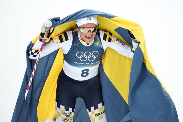 ITALY, TRENTINO-SOUTH TYROL - FEBRUARY 7, 2026: Frida Karlsson of Sweden celebrates winning a women s 10km + 10km skiathlon race during the 2026 Winter Olympic Games, Olympische Spiele, Olympia, OS at the Tesero Cross-Country Skiing Stadium 2026 Winter Olympics: Cross-Country Skiing  - ZUMAt113 20260207_zaa_t113_203 Copyright: xMikhailxTereshchenkox