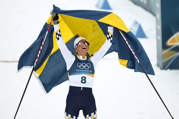 ITALY, TRENTINO-SOUTH TYROL - FEBRUARY 7, 2026: Frida Karlsson of Sweden celebrates winning a women s 10km + 10km skiathlon race during the 2026 Winter Olympic Games, Olympische Spiele, Olympia, OS at the Tesero Cross-Country Skiing Stadium 2026 Winter Olympics: Cross-Country Skiing  - ZUMAt113 20260207_zaa_t113_205 Copyright: xMikhailxTereshchenkox