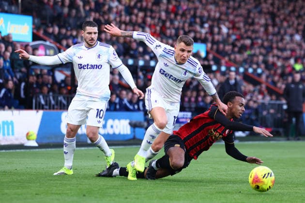 Bournemouth, England, 7th February 2026. Lucas Digne of Aston Villa fouls Eli Junior Kroupi of Bournemouth during the AFC Bournemouth vs Aston Villa Premier League match at the Vitality Stadium, Bournemouth. Picture credit should read: Paul Terry Sportimage EDITORIAL USE ONLY. No use with unauthorised audio, video, data, fixture lists, club league logos or live services. Online in-match use limited to 120 images, no video emulation. No use in betting, games or single club league player publications. SPI_014_PT_Bournemouth_Villa SPI-4512-0014