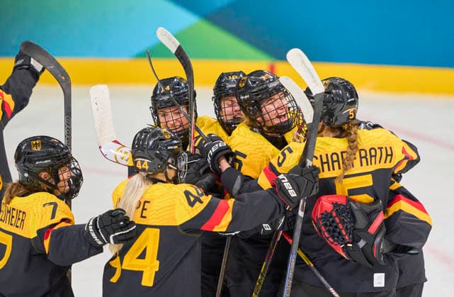 Sandra Abstreiter of Germany Laura Kluge of Germany Carina Strobel of Germany Jule Schiefer of Germany Franziska Feldmeier of Germany celebrateswith the team after the victory at the preliminary women Ice hockey, Eishockey match Group B Germany-Japan of the Milano Cortina 2026 Winter Olympic Games, Olympische Spiele, Olympia, OS at Milano Rho Ice Hockey Arena on February 7, 2026 in Milan, Italy.