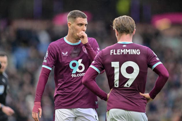 7th February 2026; Turf Moor, Burnley, Lancashire, England; Premier League Football, Burnley versus West Ham United; Maxime Esteve speaks to Zian Flemming of Burnley while waiting for play to resume  LeexDurkin