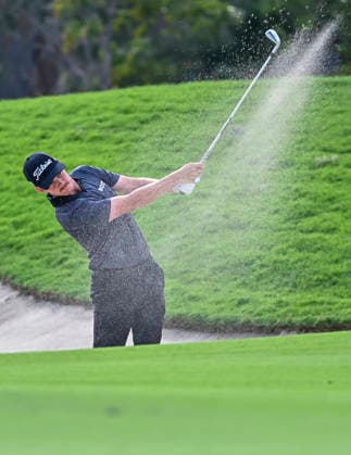 QATAR MASTERS 2026- THIRD ROUND Daniel Hillier of New Zealand plays his shot from the bunker on the 18th hole during the third round of the Qatar Masters 2026 golf tournament at the Doha Golf Club in Doha, Qatar, on February 7, 2026 DOHA Qatar Copyright: xNOUSHADx