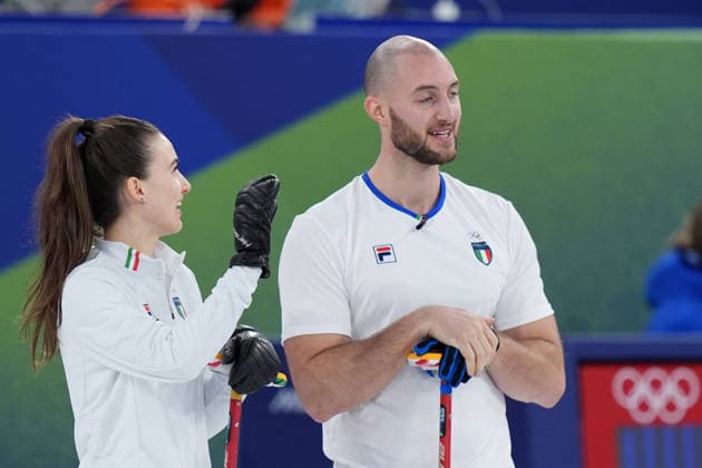 Italy s Stefania Constantini and Amos Mosaner during curling mixed doubles round robin Italy and Sweden at the Cortina Curling Olympic Stadium at the Milano Cortina 2026 Winter Olympics, in Cortina (Italy) February 7, 2026 (Spada LaPresse)  Copyright: xSpada LaPressex
