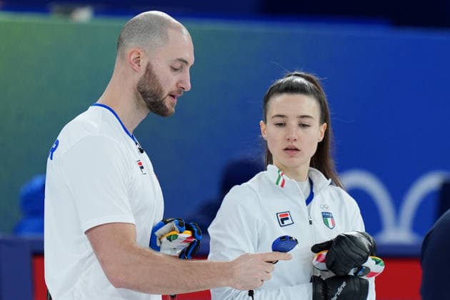 Italy s Stefania Constantini and Amos Mosaner during curling mixed doubles round robin Italy and Sweden at the Cortina Curling Olympic Stadium at the Milano Cortina 2026 Winter Olympics, in Cortina (Italy) February 7, 2026 (Spada LaPresse)  Copyright: xSpada LaPressex