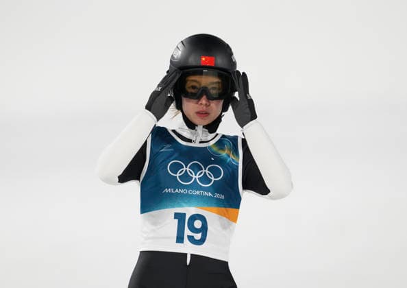 (260208) -- PULEIDAZUO, Feb. 7, 2026 -- Dong Bing of China reacts during the trial round of the Ski jumping, Skispringen, Ski, nordisch women s normal hill individual at the Milan-Cortina 2026 Olympic Winter games, Winterspiele,Spiele, Summer games in Predazzo, Italy, Feb. 7, 2026. ) (MICO2026)ITALY-PREDAZZO-OLYMPIC WINTER GAMES-SKI JUMPING-WOMEN S NORMAL HILL INDIVIDUAL MengxYongmin 
