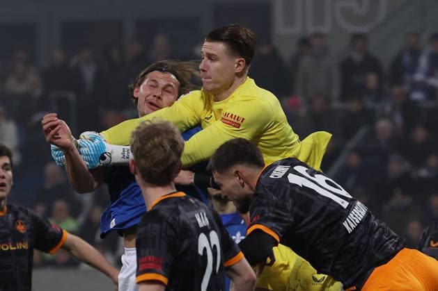 FBL-Germany 2.Bundesliga SV Darmstadt 98 - 1.FC Kaiserslautern Fynn Luca Lakenmacher (SV Darmstadt 98), Torwart Julian Krahl (1.FC Kaiserslautern) battles for the Ball during the 2.Bundesliga 2025-26 match between SV Darmstadt 98 and 1.FC Kaiserslautern at Merckstadion am Böllenfalltor on 7 February 2026 in Darmstadt, Germany (DFL DFB REGULATIONS PROHIBIT ANY USE OF PHOTOGRAPHS as IMAGE SEQUENCES and or QUASI-VIDEO)