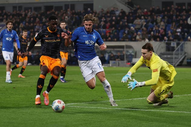 FBL-Germany 2.Bundesliga SV Darmstadt 98 - 1.FC Kaiserslautern Maxwell Gyamfi (1.FC Kaiserslautern), Fynn Luca Lakenmacher (SV Darmstadt 98), Torwart Julian Krahl (1.FC Kaiserslautern) battles for the Ball during the 2.Bundesliga 2025-26 match between SV Darmstadt 98 and 1.FC Kaiserslautern at Merckstadion am Böllenfalltor on 7 February 2026 in Darmstadt, Germany (DFL DFB REGULATIONS PROHIBIT ANY USE OF PHOTOGRAPHS as IMAGE SEQUENCES and or QUASI-VIDEO)